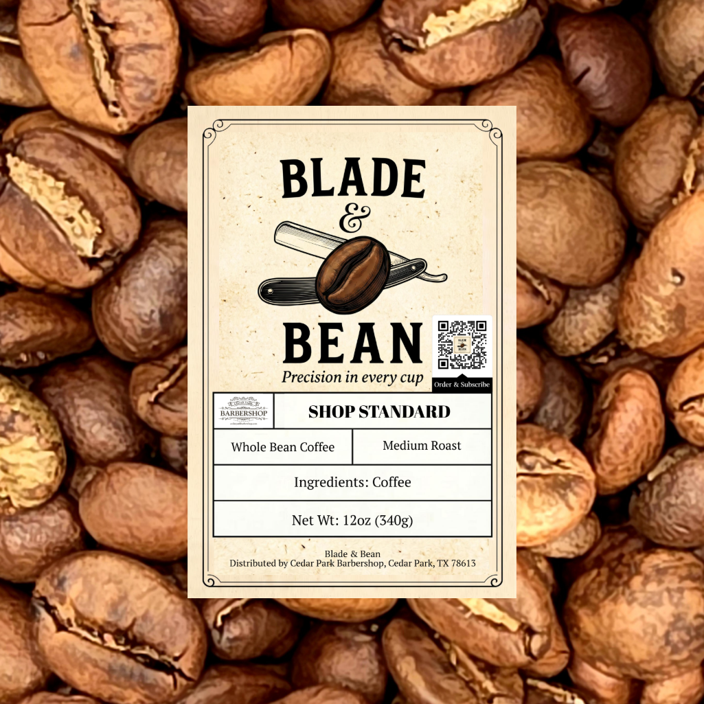 A centered cream-colored coffee label reading BLADE & BEAN with an illustration of coffee beans and a spoon, placed over a background of roasted coffee beans. The label includes Shop Standard branding and product details for whole bean coffee, medium roast, 12 oz.