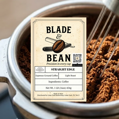 A coffee label for Blade & Bean Straight Edge espresso ground coffee is superimposed over a background photo of coffee beans being poured into a metal grinder with a whisk nearby.