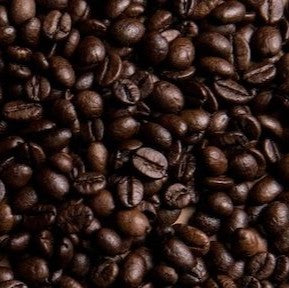 Close-up of dark roasted BARBER CUT coffee beans