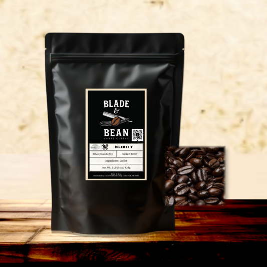 Black coffee bag with 'Blade & Bean' label on a wooden surface with coffee beans.
