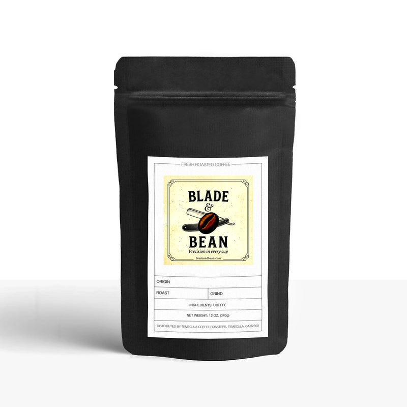 Black coffee bag with 'Blade & Bean' label on a white background