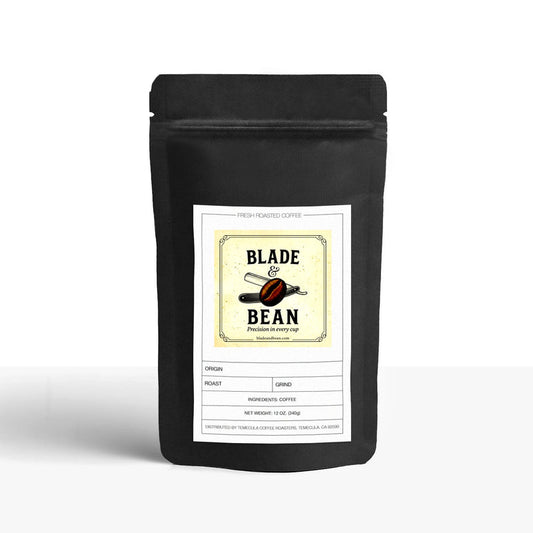 Black coffee bag with 'Blade & Bean' label on a white background