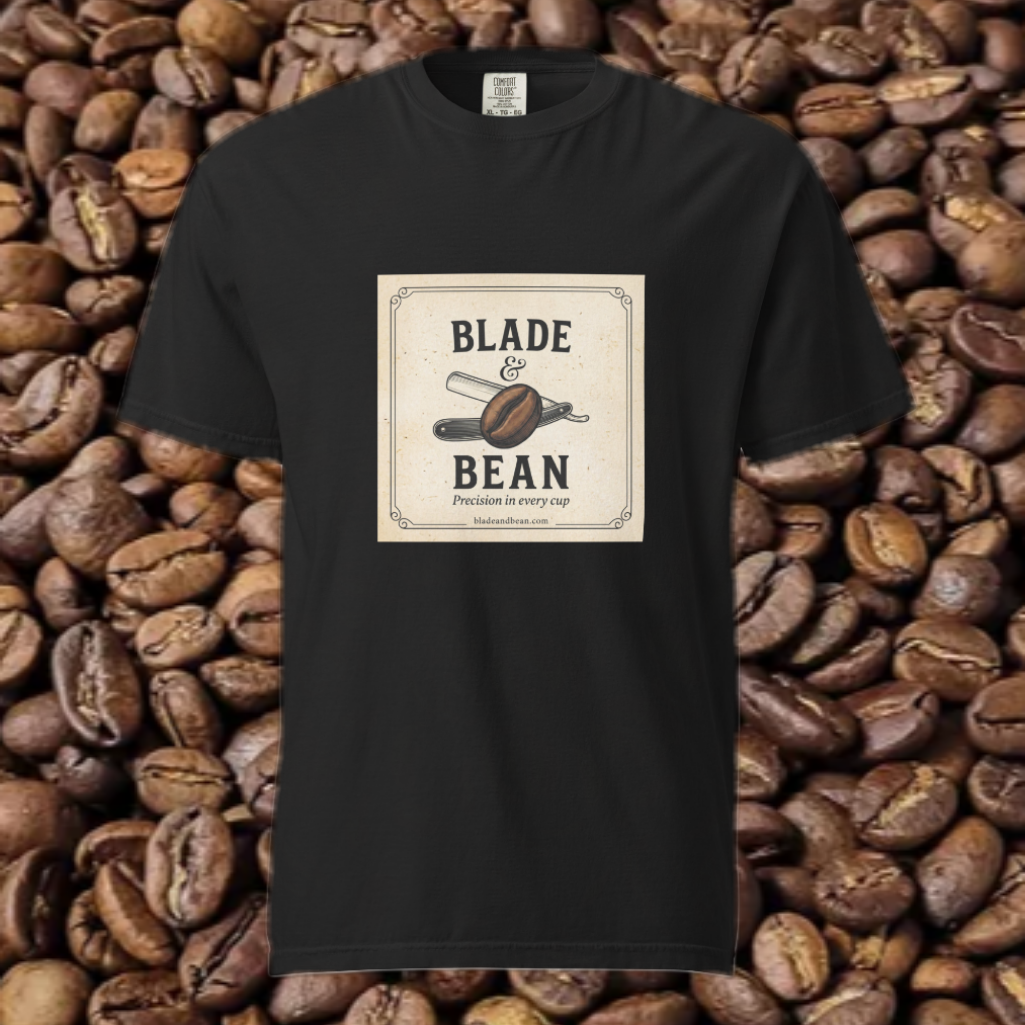 Black t-shirt with 'Blade & Bean' design on a background of coffee beans