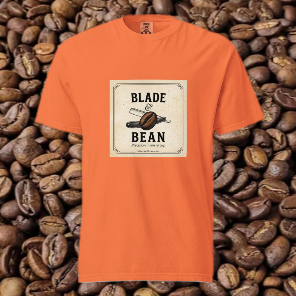 Orange t-shirt with 'Blade & Bean' design on a background of coffee beans