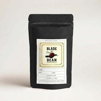 Black coffee bag with 'Blade & Bean' label on a light beige background