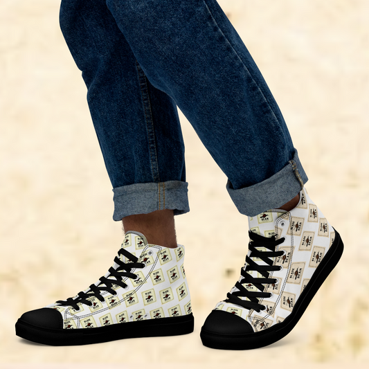 High-top sneakers with a pattern worn with rolled-up jeans on a beige background