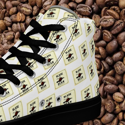 White sneaker with 'Black Bean' branding on a background of coffee beans