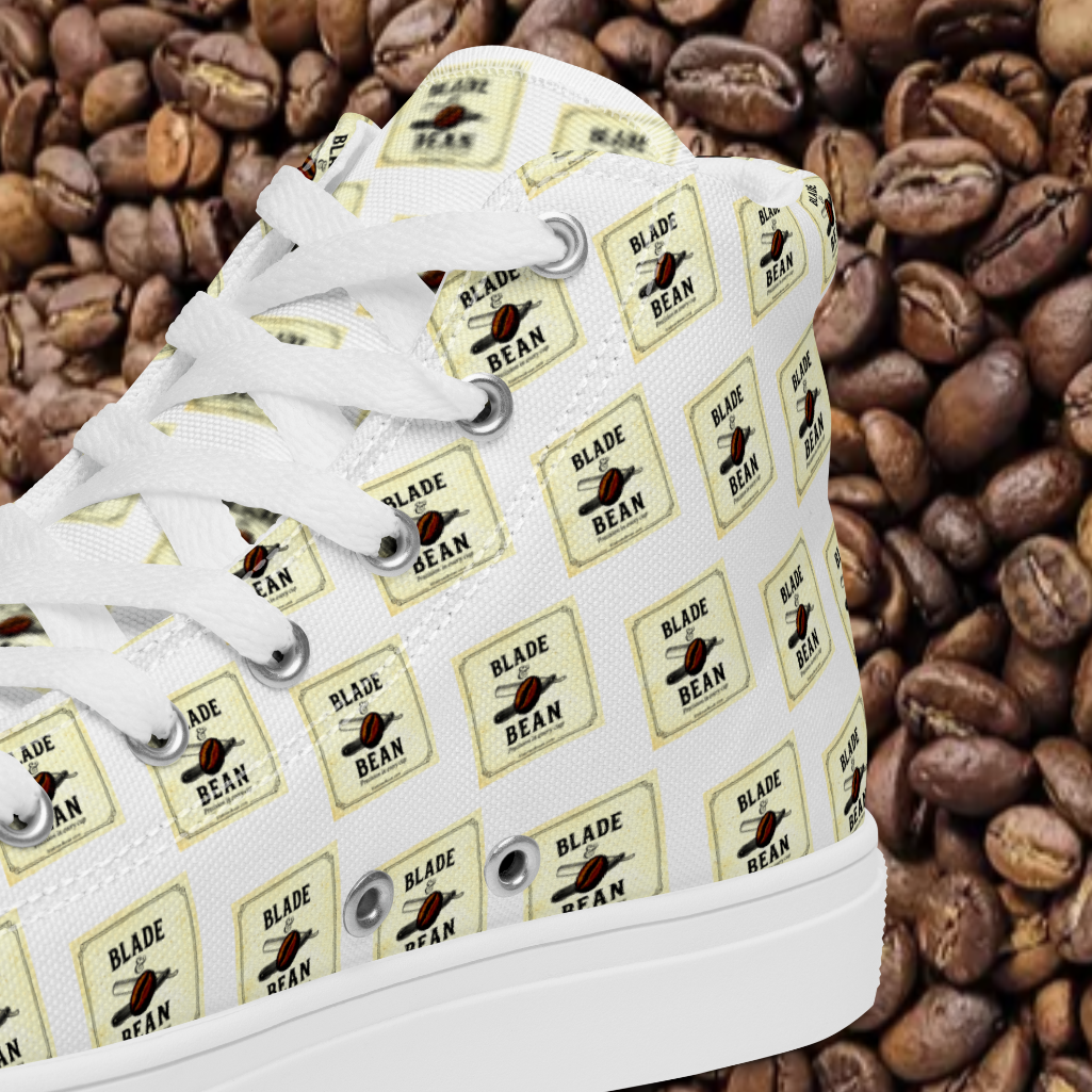 White sneaker with 'Blade & Bean' logo on a background of coffee beans