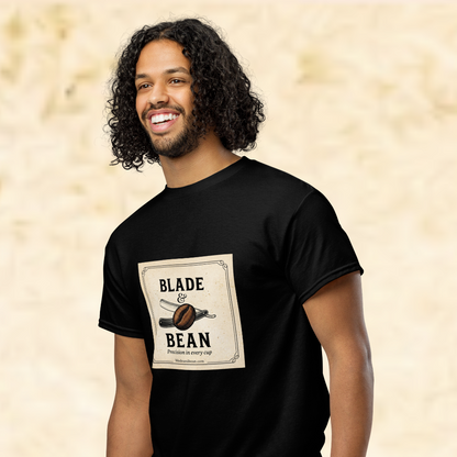 Man wearing a black t-shirt with 'Blade & Bean' design on a beige background