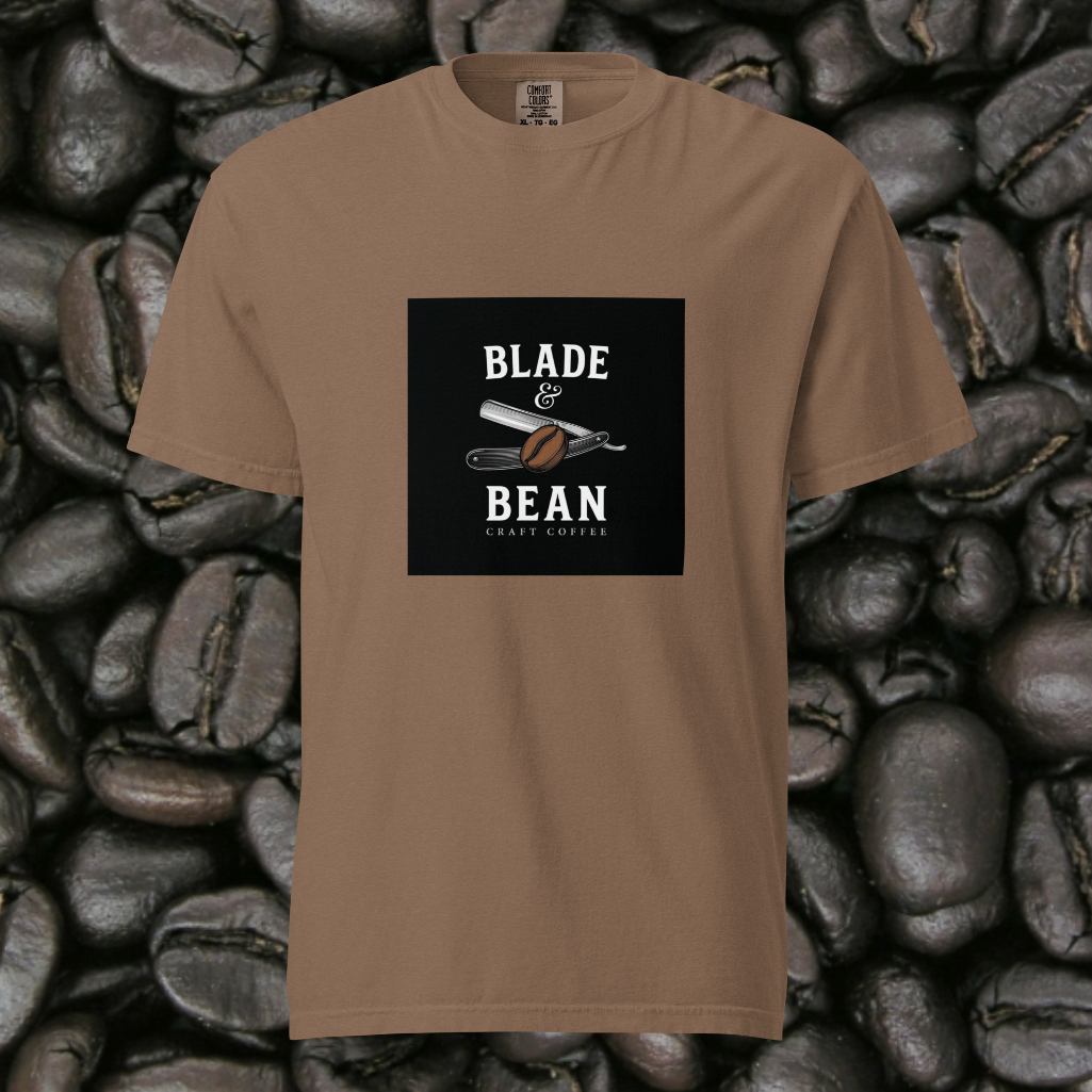 Brown t-shirt with 'Blade & Bean' graphic on a background of coffee beans