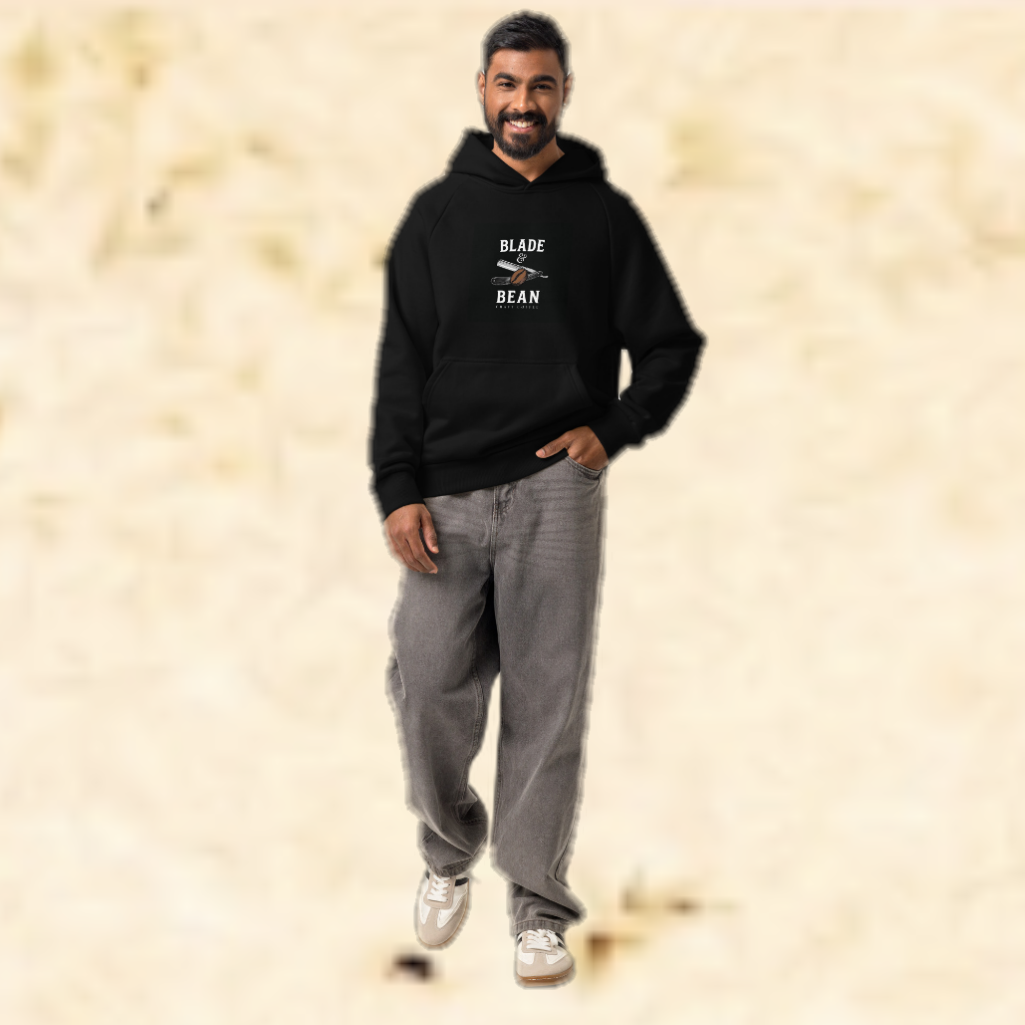 Man wearing a black hoodie with 'BLADE BEAN' logo on a beige background