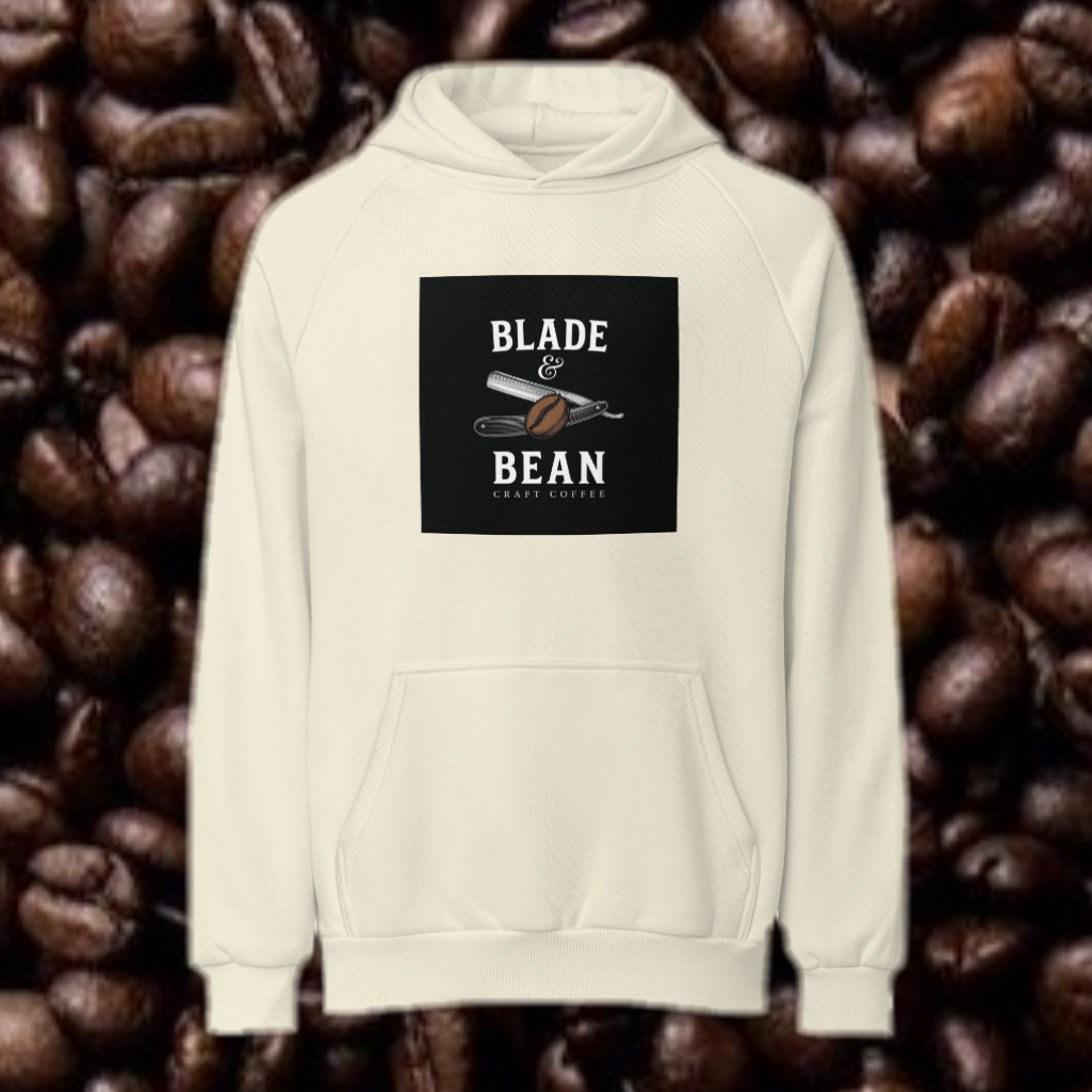 Beige hoodie with 'Blade & Bean' logo on a background of coffee beans