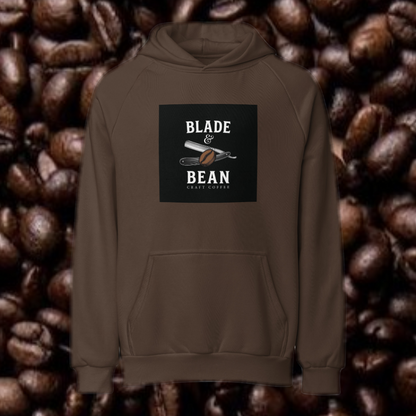 Brown hoodie with 'Blade & Bean' logo on a background of coffee beans