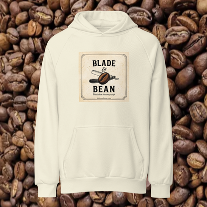 CREAM hoodie with 'Blade & Bean' logo on a background of coffee beans