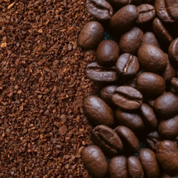 Close-up of coffee beans and ground coffee