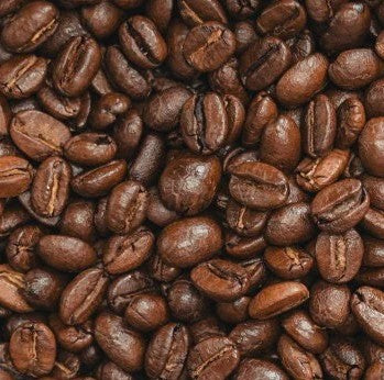 Close-up of medium dark roasted MAX Caff coffee beans