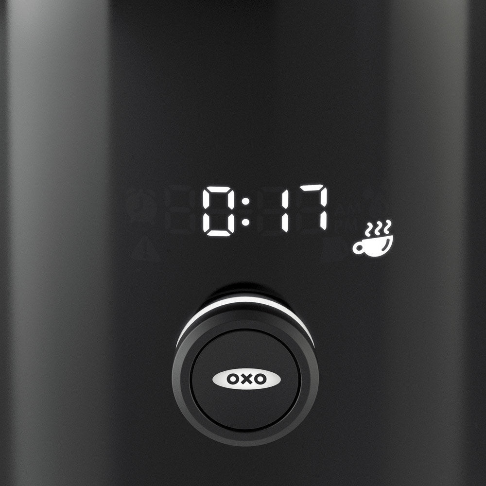Digital timer with 'OXO' branding on a black background