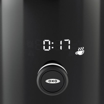Digital timer with 'OXO' branding on a black background