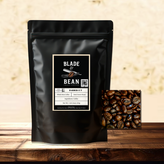 A black stand-up coffee bag labeled Blade & Bean Barburcut Specialty Coffee stands on a wooden surface against a warm beige textured background, with a small inset of roasted coffee beans beside the package.