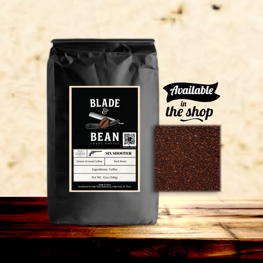 Coffee bag with 'Blade & Bean' label on a wooden surface