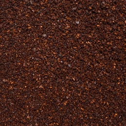 Close-up of dark brown STANDARD GROUND coffee grounds