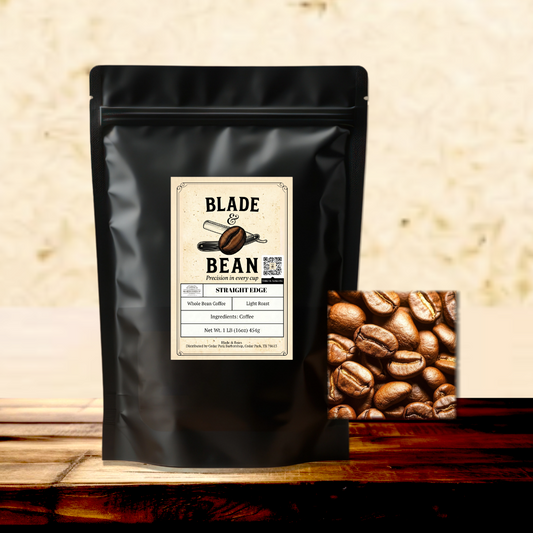Black coffee bag with 'Blade Bean' label and inset of roasted coffee beans on a wooden surface.