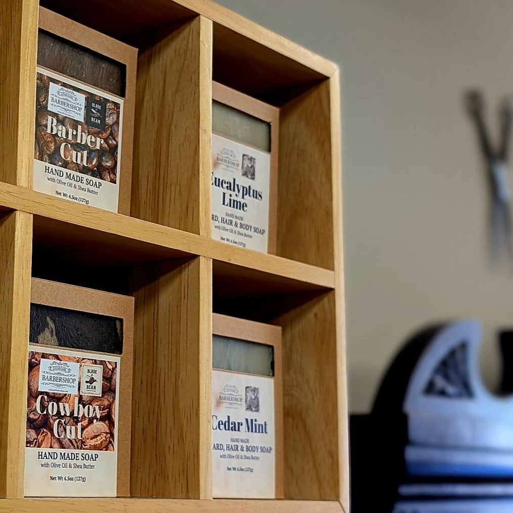 Handmade soap on a cubby display inside Cedar Park Barbershop