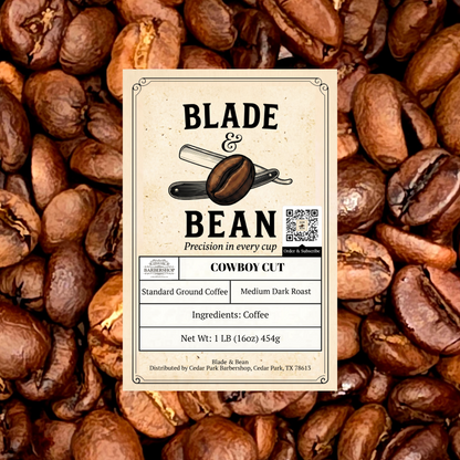 A rectangular coffee label reading BLADE & BEAN and COWBOY CUT, placed over a background filled with roasted coffee beans. The label includes product details such as standard ground coffee, medium dark roast, ingredients, and net weight.