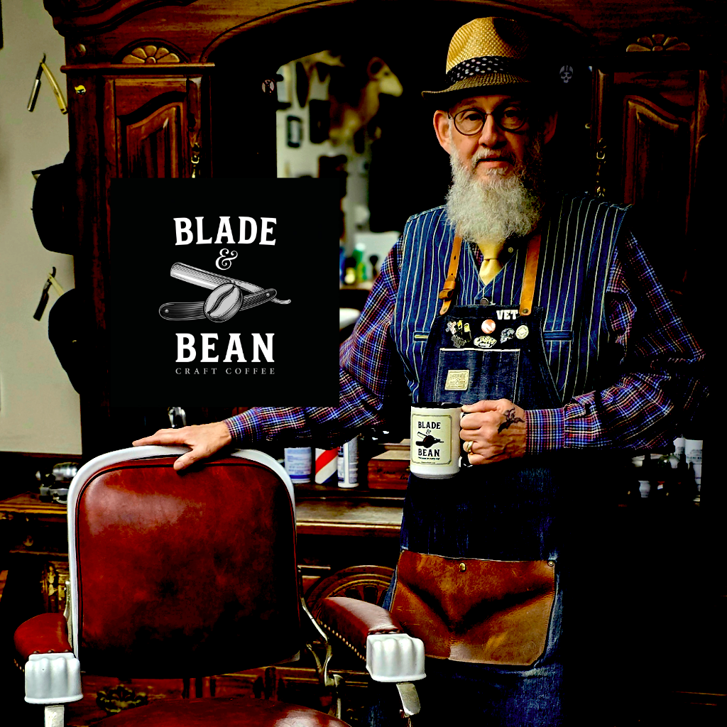 Man in a barbershop holding a 'Blade & Bean' coffee mug with the brand logo.