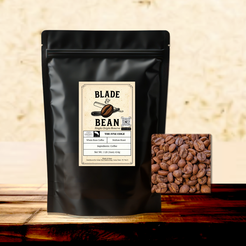 Black coffee bag with 'Blade Bean' label and coffee beans on a wooden surface