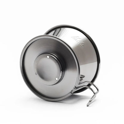 Stainless steel coffee filter on a white background