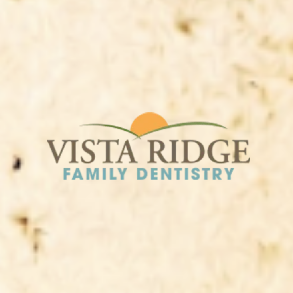 Vista Ridge Family Dentistry logo centered on a textured beige background, featuring dark gray text, a green leaf-like arch, and an orange sun.
