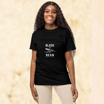 Person wearing a black t-shirt with 'Blade & Bean' logo on a beige background