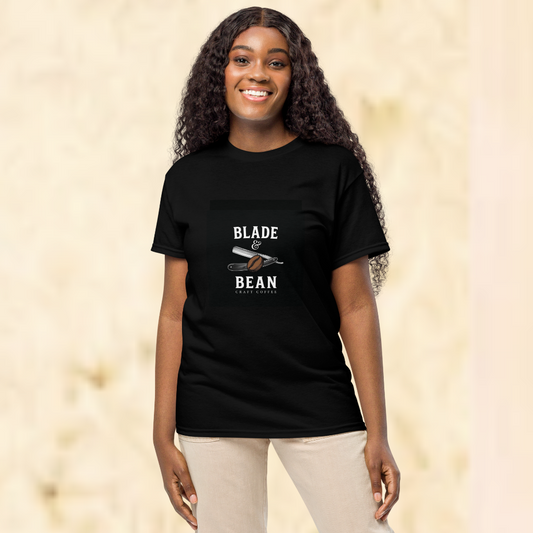 Person wearing a black t-shirt with 'Blade & Bean' logo on a beige background